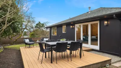 Fully fenced backyard with patio + deck