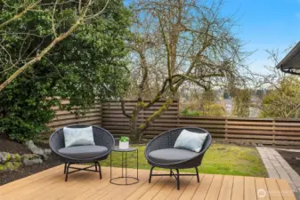 Fully fenced backyard with patio + deck