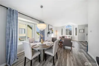 Gorgeously framed dining area with bay window.