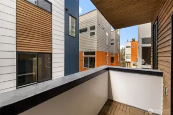 Balcony off the main living space is perfect for morning coffee or reading your favorite book