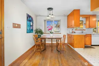 Dining area adjacent to galley kitchen.