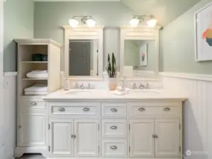 Upper floor bathroom with double sink vanity