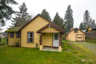 Front View of home located on .16acres with garage/shop