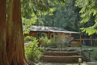 Hot tub has easy access off the Primary.  It's covered so rain or snow you can enjoy! No one can see you..