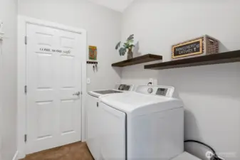 Utility room with washer and dryer that stay!