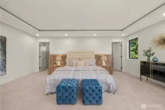The second bedroom suite upstairs offers generous space, a private bathroom with a shower—perfect for family or guests.