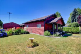 Fully fenced yard with ample space for pets, gardening, or play