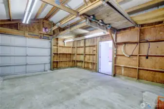 Oversized 1-car garage with room for storage, hobbies, or workshop space
