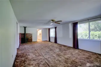 Cozy living area with free-standing gas stove for warmth and ambiance