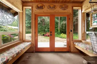 This mud room is a great place to sit, enjoy a good book and enjoy the graceful beauty that surrounds you.