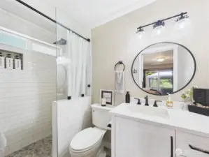 Primary bathroom has been beautifully remodeled.