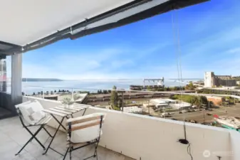 Covered outdoor deck, perfect for sipping your favorite beverage and relaxing, taking in the amazing views
