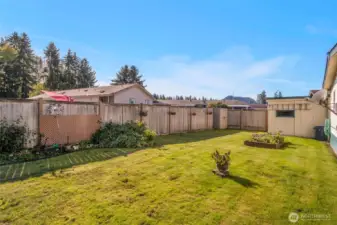 Private fenced backyard.