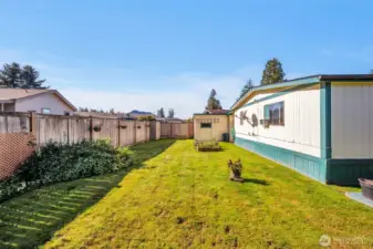 Private fenced backyard.