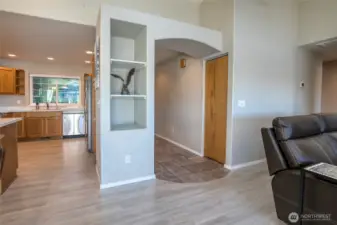 Another display niche. Notice the beautiful, warm colored tile from the front door into the livingroom.