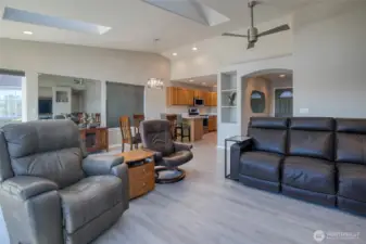 Notice additional seating at the bar.  This room will easily accomodate many people!