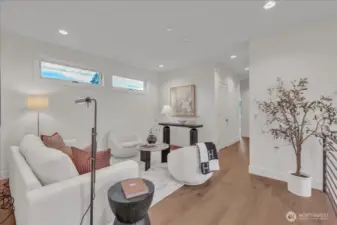 Upper level loft! Perfect space for playroom or den.