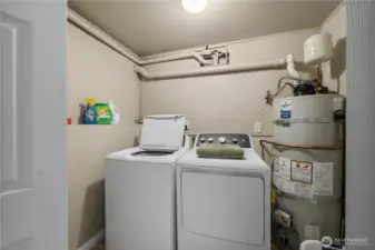 The Laundry. GE Washer/Dryer Stay and a Brand New Top of the line Hot Water Heater.