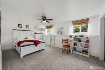 Or this could be your primary…..it’s a beautiful space, too! Updated lighting, ceiling fans and Custom Bali Roman Shades throughout!