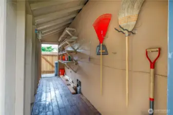 Another view of shed. Convenient passing from the front yard to the back yard.