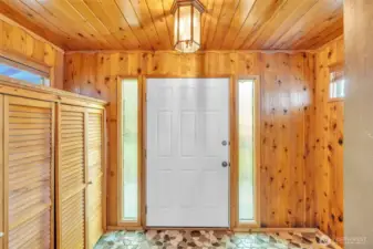 Front door entry hall all in knotty pine