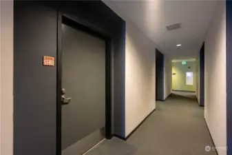 Well-lit spacious hallway.