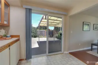 Sliding door off the kitchen goes to covered patio