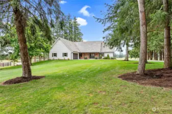 House sits well off the road on 10 acres.