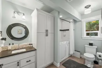 The lower bathroom has ADA accessibility with the walk in shower/tub