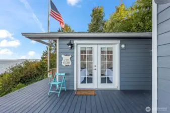 With this darling beach cottage just steps away