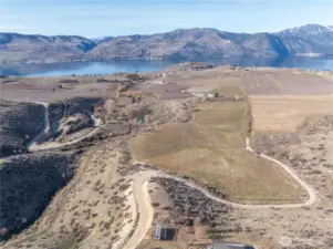 Birds eye view, captures the access and Lake views from atop this amazing property.