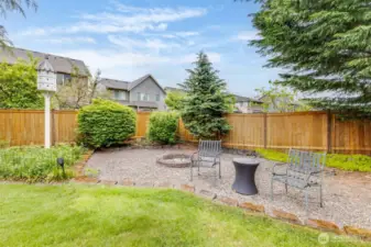 Firepit at rear of yard.