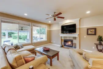 Lots of windows, extends to outdoor space and beautiful covered patio.