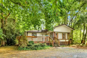 Comfortable single-wide offers a place to live while you design and build your forever home.