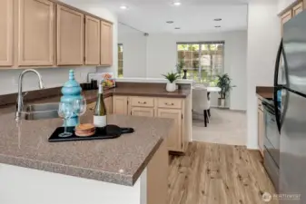 New floor coving and quartz countertops in the kitchen
