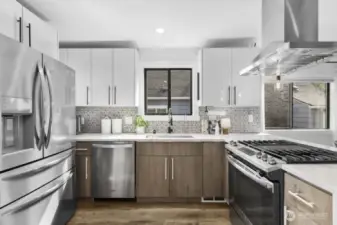 Stainless steel appliances including new Breville 3-in-1 toaster oven/air fryer stay with the home.