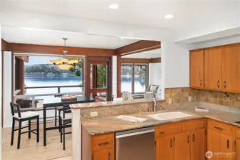 The Granite countertops  compliment the cabinets