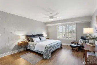 This primary bedroom must-haves include the sizable walk-through closet and en-suite bathroom. Bonus - it also has the added luxury of abundant natural light and views.
