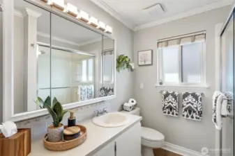 Perks within the en-suite bath include a large walk-in shower and wide vanity that ease the daily routines.