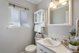 The powder room makes a convenient daily pit-stop and allows guest to freshen up without entering the private bedroom zone.