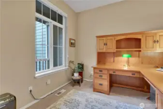 Main floor office/den/study is accessed easily through french doors as you enter the home to the left.