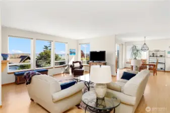 View from the living room to the dining room. Enjoy the views from nearly every room.