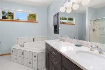 Primary bath has double sinks and a jetted tub, and more.