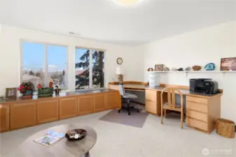 Built-in desk and cabinets.