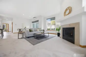 Looking across the condo from the living room toward the front entry.