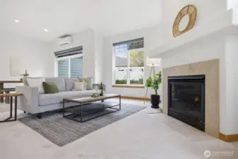 There is a lovely gas fireplace for those chilly winter evenings. The heat is radiant floor heat and there are 3 mini-splits for heating and cooling, also.