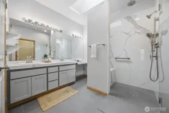 Looking at the large 2-sink vanity at the primary suite.