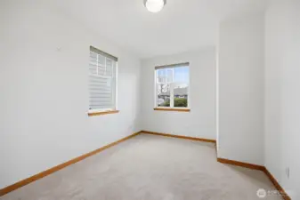 The second bedroom looks out to the front of the home and is south-facing.