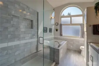 Primary bathroom with large soaking tub and walk in shower!