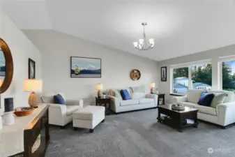 Formal Living room with vaulted ceiling.